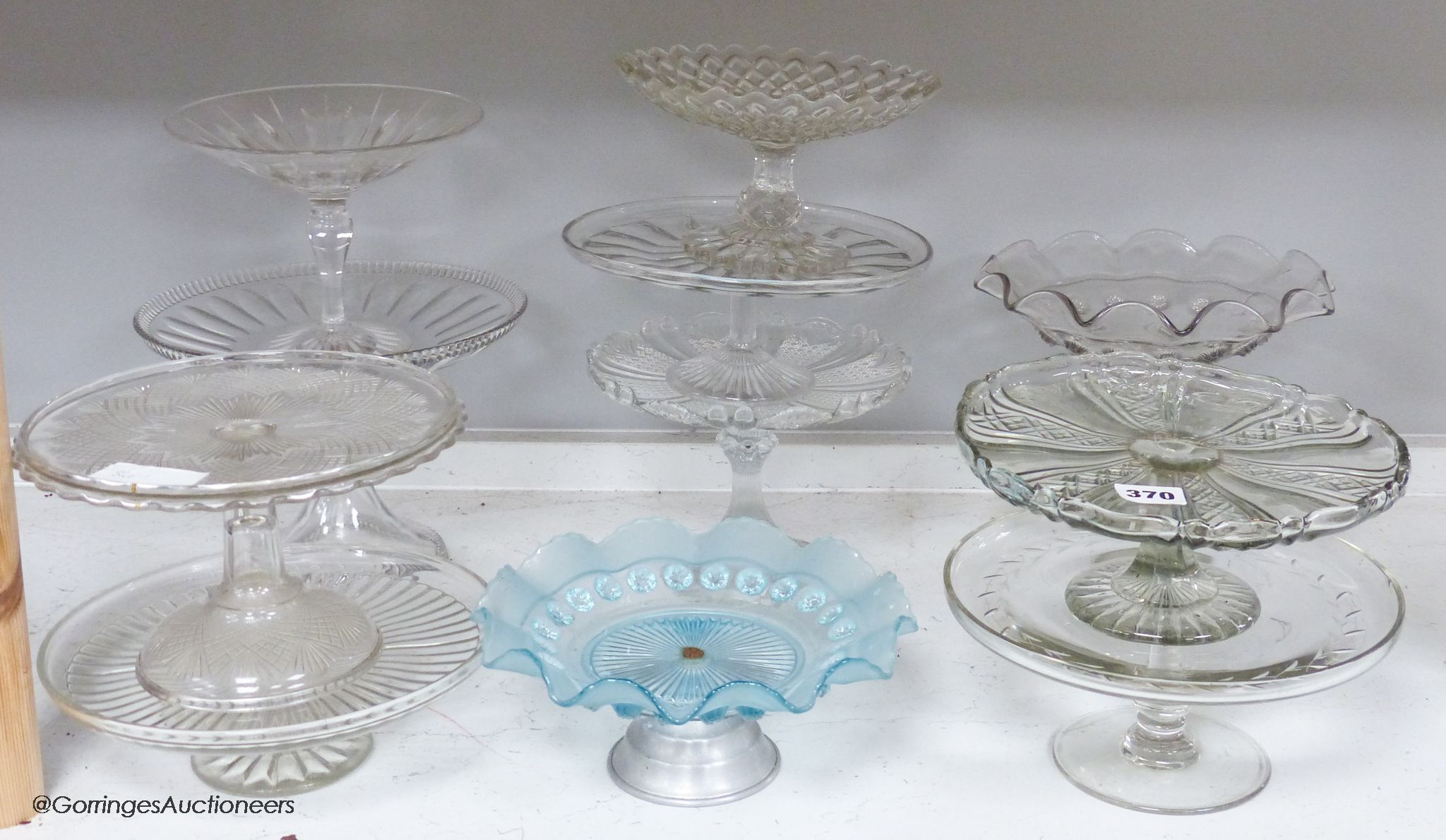 Twelve various glass cake stands